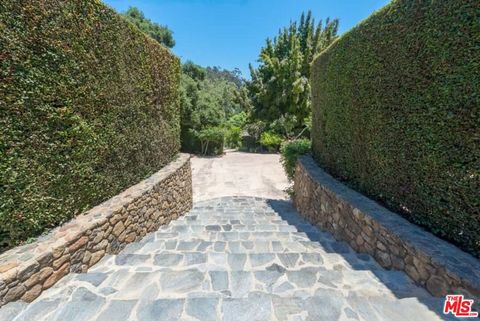 Tiny photo for 1957 MANDEVILLE CANYON Road, Los Angeles, CA 90049 (MLS # 25615483)