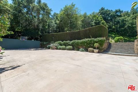 Tiny photo for 1957 MANDEVILLE CANYON Road, Los Angeles, CA 90049 (MLS # 25615483)