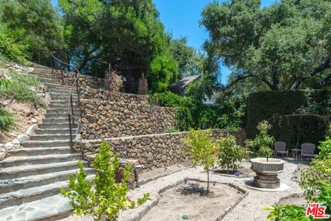 Tiny photo for 1957 MANDEVILLE CANYON Road, Los Angeles, CA 90049 (MLS # 25615483)
