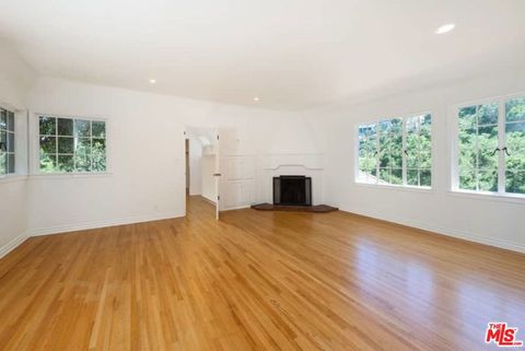 Tiny photo for 1957 MANDEVILLE CANYON Road, Los Angeles, CA 90049 (MLS # 25615483)