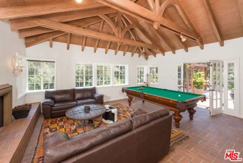 Tiny photo for 1957 MANDEVILLE CANYON Road, Los Angeles, CA 90049 (MLS # 25615483)