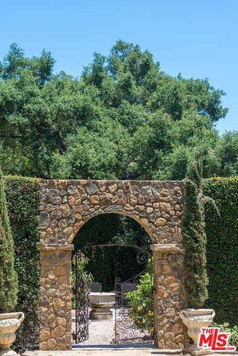 Tiny photo for 1957 MANDEVILLE CANYON Road, Los Angeles, CA 90049 (MLS # 25615483)