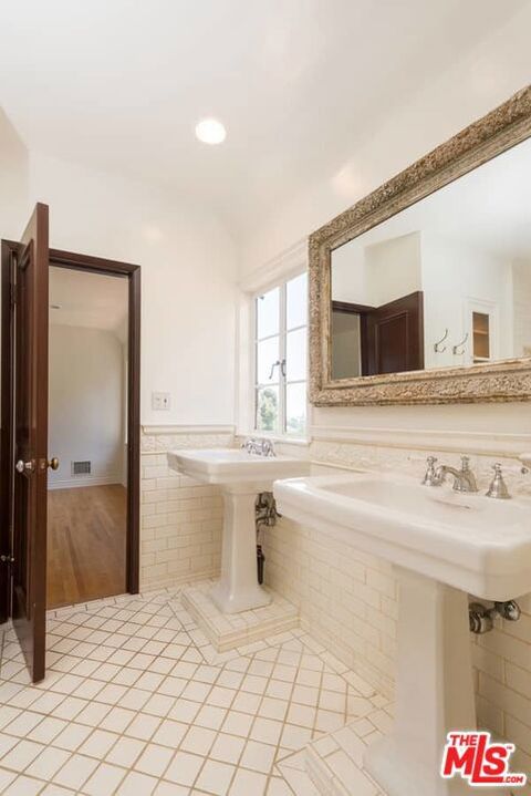 Tiny photo for 1957 MANDEVILLE CANYON Road, Los Angeles, CA 90049 (MLS # 25615483)