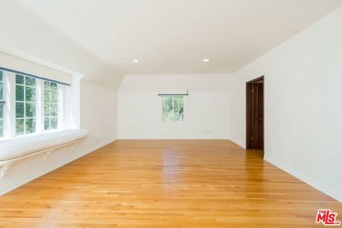 Tiny photo for 1957 MANDEVILLE CANYON Road, Los Angeles, CA 90049 (MLS # 25615483)