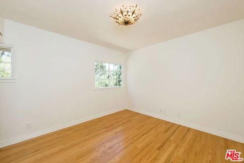 Tiny photo for 1957 MANDEVILLE CANYON Road, Los Angeles, CA 90049 (MLS # 25615483)