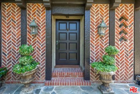 Tiny photo for 1957 MANDEVILLE CANYON Road, Los Angeles, CA 90049 (MLS # 25615483)