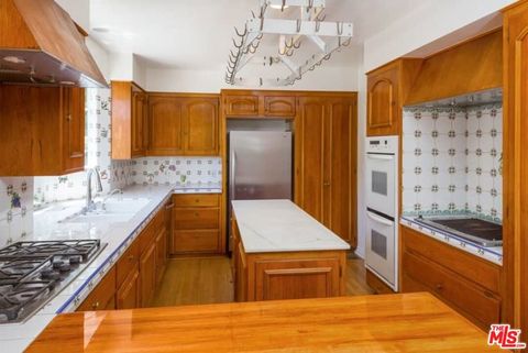 Tiny photo for 1957 MANDEVILLE CANYON Road, Los Angeles, CA 90049 (MLS # 25615483)