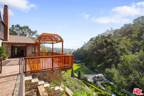 Tiny photo for 1957 MANDEVILLE CANYON Road, Los Angeles, CA 90049 (MLS # 25615483)
