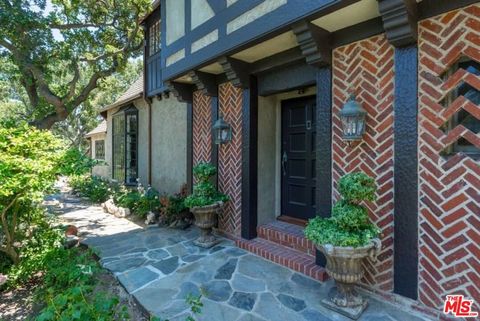 Tiny photo for 1957 MANDEVILLE CANYON Road, Los Angeles, CA 90049 (MLS # 25615483)