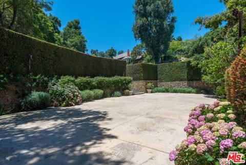 Tiny photo for 1957 MANDEVILLE CANYON Road, Los Angeles, CA 90049 (MLS # 25615483)