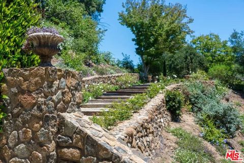 Tiny photo for 1957 MANDEVILLE CANYON Road, Los Angeles, CA 90049 (MLS # 25615483)