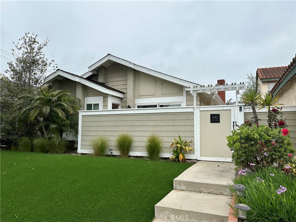 Welcome to this stunning, fully furnished 3-bedroom, 2-bathroom single-story home, perfectly located in the heart of Downtown Huntington Beach. Just a mile from the beach and within walking distance to shops, restaurants, and Main Street, this move-in ready property offers the ultimate in coastal convenience and comfort.
Step into your private gated front yard complete with patio furniture, outdoor heaters, BBQ, and stylish outdoor living space. Inside, the all-inclusive granite kitchen features everything you need—from cookware and utensils to barstools, dishwasher, refrigerator, and microwave. The spacious living areas include a dedicated dining room with a 6-seater table and built-ins, a cozy family room with individual sofa chairs, and an expansive living room with a fireplace, flatscreen TV, vaulted ceilings, decorative accents, and plenty of natural light. Each bedroom offers vaulted ceilings, natural light, and generous storage. The Jack-and-Jill bathroom connects two bedrooms and includes granite counters and ample cabinetry, while the second bathroom features barn door-style storage and a full-size bathtub.
The laundry room is equipped with a high-efficiency washer and dryer, vacuums, cleaning supplies, and acts as a buffer between the home and attached garage. The security-coded 2-car garage includes a second refrigerator, garage remote, recently installed storage areas, two portable AC units, extra pillows and chairs, gardening tools, and two e-bikes available for an additional fee. Beyond the garage, the shared greenbelt offers a beautifully maintained retreat with trees, flowers, lounging areas, bird watching, and a small play space—perfect for outdoor enjoyment.
Gardening is included in the rent and a lease term of 6 to 12 months is available. Don’t miss this rare opportunity to live in a fully furnished, single-family home in one of Huntington Beach’s most desirable neighborhoods. No smoking is permitted. Pets will be considered with photos and breed information.