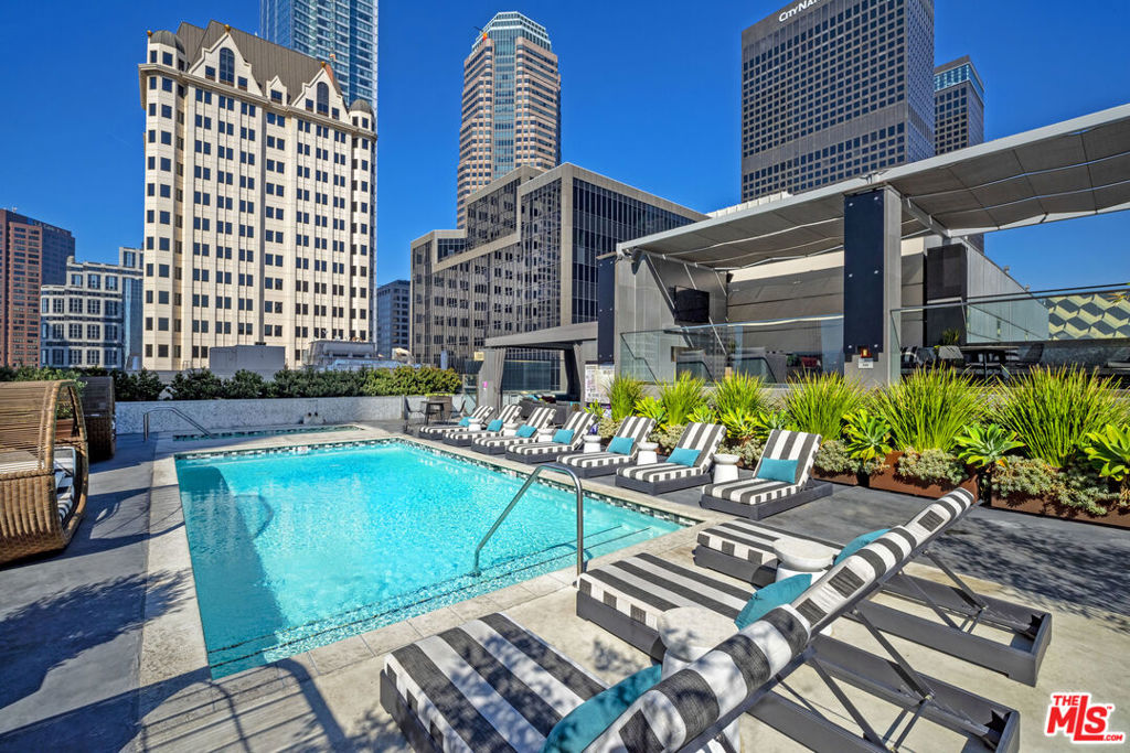 Penthouse 1312 features a second bedroom and bathroom, three story loft unit, soaring ceiling heights, den, private outdoor patio with a view of the pool. "Look and Lease Special." Take up to EIGHT weeks FREE rent on our exclusive move-in promotion. 4 weeks free, 4 weeks on 'Look and Lease" for total of 8 weeks free. Offer subject to change without notice, prices change weekly, book your appointment ASAP and ask for details on this promotion. We tour every day except SUNDAYS/holidays. ID is required. PET FRIENDLY BUILDING and low security deposits! Loft has soaring ceiling heights, lots of natural light through large windows. 24/7 gym, Parcel Pending secure locker system sends you a text you when you have a package to pick up,  24/7 Concierge and valet parking -text to retrieve your car-day or night! Bosch appliances; ranges, microwave, dishwasher, washer/dryer in all units, trash chutes on every floor. Pool, spa, indoor/outdoor shaded lounges, oversized TV and comfy sofas in community areas, wine room has private lockers and meeting area. Restaurants, bars, shopping, amenities within a short distance. Beautifully furnished guest suite/apartment can be rented by current Tenants for their visitors & guests - a great amenity! Whole Foods, Ralphs, Smart & Final, Target, Grocery Outlet are close by. Across the street is The Bloc shopping district featuring Uni-qlo and Macy's, bars and restaurants. Building is located above the 7th St/Metro Center red line that is a subway hub to all subway lines. One metro stop from LA Live, LA Convention Center. Tours available everyday except Sundays and holidays. IDs are required to tour. Agent to independently verify SF, lease rate and availability with leasing department. Many loft options available in bldg in all price ranges and SF. Prices and lease specials are subject to change weekly. Complimentary valet parking while touring.
