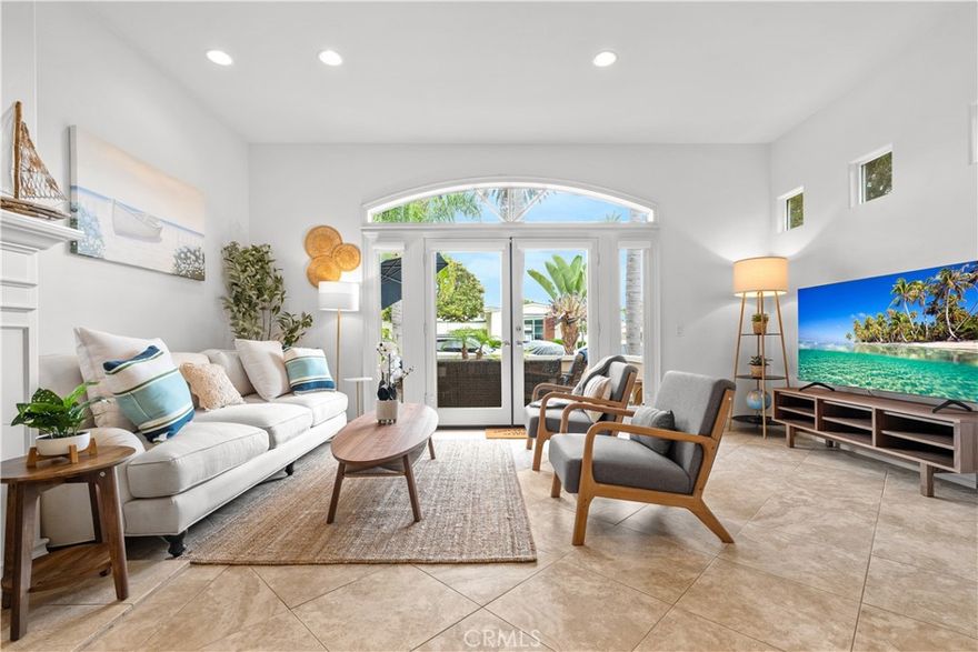Just minutes walk to Main Street downtown Huntington Beach and the sand! Perfectly situated between the beach and world class amenities just beyond the front door is this coastal retreat newer built in 2000, 3 bedrooms, 3.5 bathrooms and a living of 2,387Sqft that serves well as vacation rental or a permanent residence near the ocean, this property has it all.  Step through charming French doors into a bright open floor plan featuring a cozy living room with fireplace, inviting dining area and a chef-worthy kitchen with upgraded quartz countertops and new stainless steel Bosch cooktop. The first floor also includes a spacious family room, ideal for entertaining.  Upstairs, the luxurious primary suite boasts a private balcony, spa-inspired bath, and walk-in closet. Two additional ensuite bedrooms and a den provide flexibility for guests or a home office, plus the convenience of an upstairs laundry room.  Head up to the rooftop deck to enjoy ocean breezes, sunsets, and 4th of July fireworks with views that capture the best of Huntington Beach living. Additional highlights include attached two-car garage, large driveway that can fit additional three cars, a new HVAC system, tankless water heater, and outdoor shower — perfect after a day at the beach. Currently operating as a successful short-term vacation rental and got highly rated on multiple platforms.  Don't miss out on the opportunity to make this your forever home and experience all that downtown Huntington Beach has to offer. Live, host, or invest — your beachside lifestyle starts here!