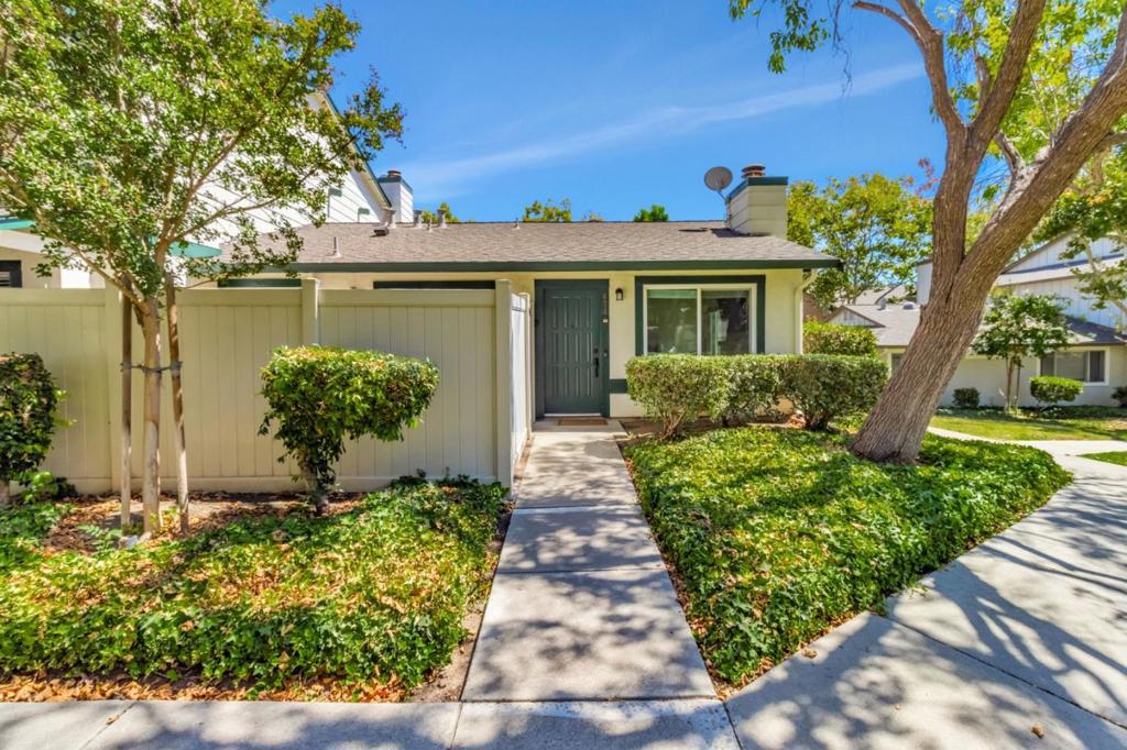 Discover comfortable living in the heart of San Jose with this charming 2-bedroom, 2-bath home offering 1,040 sq ft of thoughtfully designed space. The open-concept living and dining areas create the perfect setting for both everyday comfort and entertaining guests, while a cozy fireplace adds warmth and character.The kitchen features an electric oven range and offers a functional layout for all your cooking needs. Enjoy the convenience of a dedicated laundry area with your own washer and dryer. Stylish laminate flooring flows throughout the home, complemented by central forced air and electric heating for year-round comfort.A 1-car garage provides secure parking and storage. This home is located in the sought-after Berryessa Union Elementary School District, known for its strong educational programs.Enjoy the best of urban living in San Jose a welcoming home in a desirable community close to schools, shopping, dining, and more.