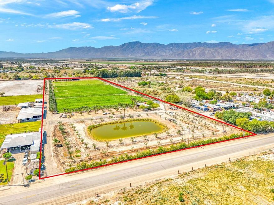 ***Opportunity Zone Property***Rare opportunity to acquire a fully improved 11.09-acre agricultural property in Thermal, CA, located in unincorporated Riverside County and zoned R-A-20 (Residential Agricultural). This zoning allows for a variety of uses, including single-family residential, farming, animal raising, equestrian facilities, and certain conditional agricultural operations. R-A-20 supports low-density rural development while offering wide flexibility for agricultural and ranching operations.The property is fully equipped for immediate use with nearly 600 mature date palms, 12 covered horse corrals, multiple irrigated pastures for livestock, and a large hay cover structure. A shared well, canal water, on-site reservoir, and electric power are already in place, ensuring strong infrastructure for both farming and livestock needs.A mobile home with septic system and electric service is positioned near the main working area--ideal for ranch management, staff housing, or a future ADU upgrade. The property is fully fenced and gated for large vehicles and equipment. Existing improvements make this farm turnkey for agricultural operators, horse boarding, or investment with income potential from crop production and ag leasing.Located just seconds from Hwy 86, Jacqueline Cochran Airport, and the Thermal Club, this farm offers ease of access while preserving privacy and rural function. Ideal for owner-users, ag investors, or equestrian operators looking for water, infrastructure, and room to grow in the Coachella Valley.