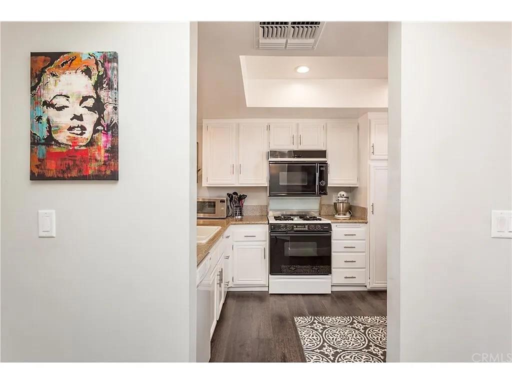 100% Application before tour. Available: Aug 31th Pet Allowed. Seize this rare top-floor condo in serene Clark Terrace. Step through the gate and let the soothing waterfalls and whispering pines wash over you. Inside, your bright retreat features vaulted ceilings, two bedrooms (including a master suite), and two bathrooms. Upstairs, a versatile loft opens to a private balcony with stunning treetop views. You'll love the spacious kitchen and convenient in-unit laundry. Enjoy two parking spots plus incredible community perks: a sparkling pool, spa, sauna, grills, picnic spots, and tennis courts. This unique blend of tranquility and amenities won't last don't wait! App Fee: $99 No Pet Fee. No move-in Fee