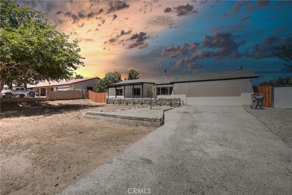 What a gem! This tastefully remodeled 4-bedroom, 2-bath home offers the perfect blend of style, space, and serenity — tucked away in a peaceful, family-friendly neighborhood. Set on a sprawling 18,000 sq ft of flat, usable land with rare RV access, it’s a rare opportunity that delivers exceptional value.
The covered patio overlooks breathtaking mountain views, creating a tranquil atmosphere ideal for relaxing mornings, family gatherings, or simply enjoying the sunset in peace.
Inside, you’ll find thoughtful upgrades throughout: brand new doors and dual-pane windows, plush new carpet, fresh designer paint, and a whole-home water filtration system. Big-ticket updates like a new septic tank and a newer A/C unit offer lasting comfort and peace of mind.
Homes with four true bedrooms at this price point are hard to find, making this an outstanding choice for families or anyone needing both space and sophistication.
With quick freeway access, commuting is easy — but you’ll love coming home to the calm and character this home provides. Whether you’re looking to raise a family, entertain, or just enjoy the lifestyle you’ve been working toward, this home has everything you need to make it yours.