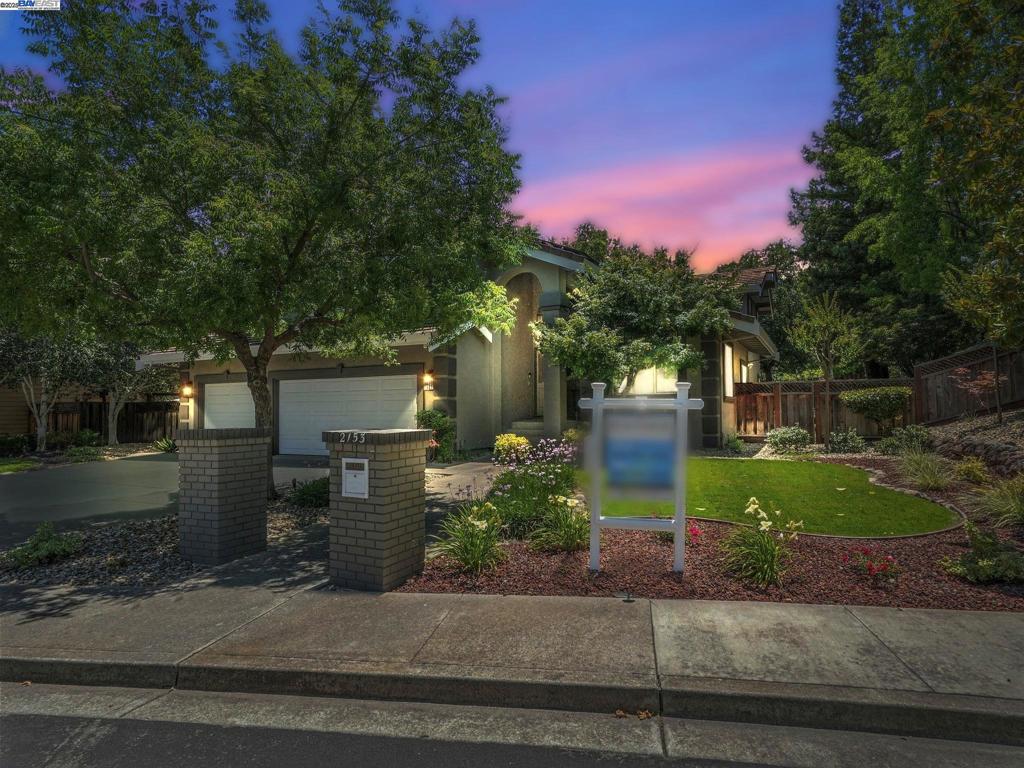 STUNNING SOUTH LIVERMORE RETREAT! This highly updated home features a versatile floor plan ideal for multi-generational living, work-from-home needs, or hosting gatherings. Bright open layout, soaring ceilings, and large windows offer plenty of natural light. The gourmet kitchen showcases stunning quartzite countertops, stainless steel appliances, a generous island, and ample cabinet space—perfect for preparing family meals or entertaining guests! The home’s layout includes two large bedrooms and a full bathroom located downstairs—ideal for guests, extended family, or a home office. Upstairs, you’ll find three additional bedrooms, including a truly luxurious primary suite complete with a cozy fireplace, a spacious walk-in closet, and a spa-like updated bthrm featuring a freestanding soaking tub and sleek finishes. Other features: owned solar panels, dual-zone A/C, three car garage and more! The outdoor space is a true entertainer’s paradise. Relax or host gatherings under the large pergola with ceiling fans & flat-screen TVs or by the tranquil waterfall feature & relaxing hot tub. A bonus is the half bath located off the backyard for your guests convenience. Centrally located to award winning schools, freeways, shopping, trails & downtown! Make this South Livermore gem yours!