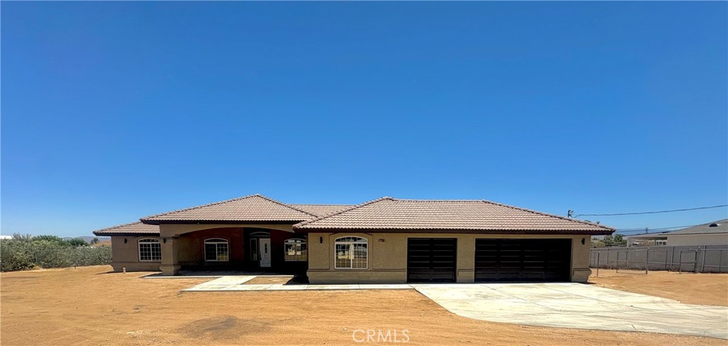 Welcome to this gorgeous 5-bedroom, 4-bathroom home, just under 3000 sq. ft. of single-level living on a generous 44,866 sq. ft. fenced lot in Hesperia. This property boast a split floor plan, perfect for modern living. The kitchen features granite countertops, built-in appliances, and a convenient walk-in pantry. Separate Family Room w/ Fireplace. Formal Dining, Formal Living Room & Breakfast Nook. This home also offers two primary bedrooms with adjoining bathrooms. Indoor Laundry & three car garage, as well. Additionally, the expansive lot provides for a potential ADU ( Additional Dwelling Unit), making this property an excellent choice for multi-generational living. Commuter Close. This Beautiful Home has recently been painted and new carpet installed and is ready for you to move right in!