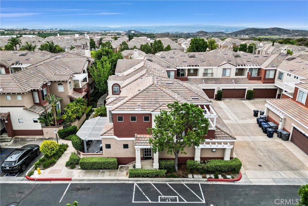 Welcome to the highly desirable Vineyards Community of Foothill Ranch. This unit is a 2 bed, 2.5 bath home that has direct access from the 2 car garage. Downstairs features tile flooring throughout with light neutral colors and has direct access to the side patio. The large kitchen features granite countertops, recessed lighting, plenty of cabinet space for storage and a built-in stove and oven. The living room is spacious and has a cozy and inviting fireplace. Garage features custom built in storage and tool bench. Upstairs boasts a large primary suite with a walk-in closet. The secondary bedroom has a full bath with its own private balcony. The laundry area is conveniently located upstairs between both bedrooms. Custom upgrades include: Brand New PEX Piping, crown molding and updated base boards. Vineyard's residents enjoy resort-style amenities including parks, pool/spa, & children’s playground. Conveniently located close to the Irvine Spectrum, Foothill Ranch Towne Center, award-winning schools, and Whiting Ranch Wilderness Park. Easy Toll Road & Freeways Access makes it a great location. Apply via RentSpree at: https://apply.link/qRvwZTA