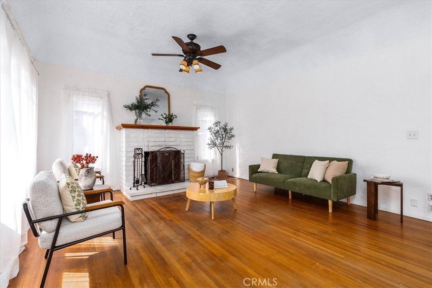 NEW PRICE on this charming 1931 single-story home with character situated on an oversized 5,035 sq. ft. lot. This 2-bedroom, 1-bath home features original hardwood floors throughout, tile flooring in the kitchen and bath, and a cozy living room with an actual fireplace as its centerpiece. The primary bedroom includes French doors leading to the backyard and a faux stone fireplace for added charm. A new roof was added in the last year and the foundation was leveled!



The kitchen offers pride-of-ownership enhancements with updated cabinetry, stainless steel appliances, and generous storage.  A dedicated laundry room adds convenience.



Outdoors, enjoy a large backyard with a deck perfect for entertaining, mature trees for shade, and multiple sheds, one large and two smaller, for storage or projects. A workbench with vice is included. The property also provides a 3-car driveway and RV parking, making it both versatile and functional.



Located in a desirable Lakewood neighborhood, this home is close to schools, shopping, dining, and nearby parks, offering both comfort and convenience. With its mix of vintage charm and recent upgrades, it’s a wonderful opportunity to make your own.