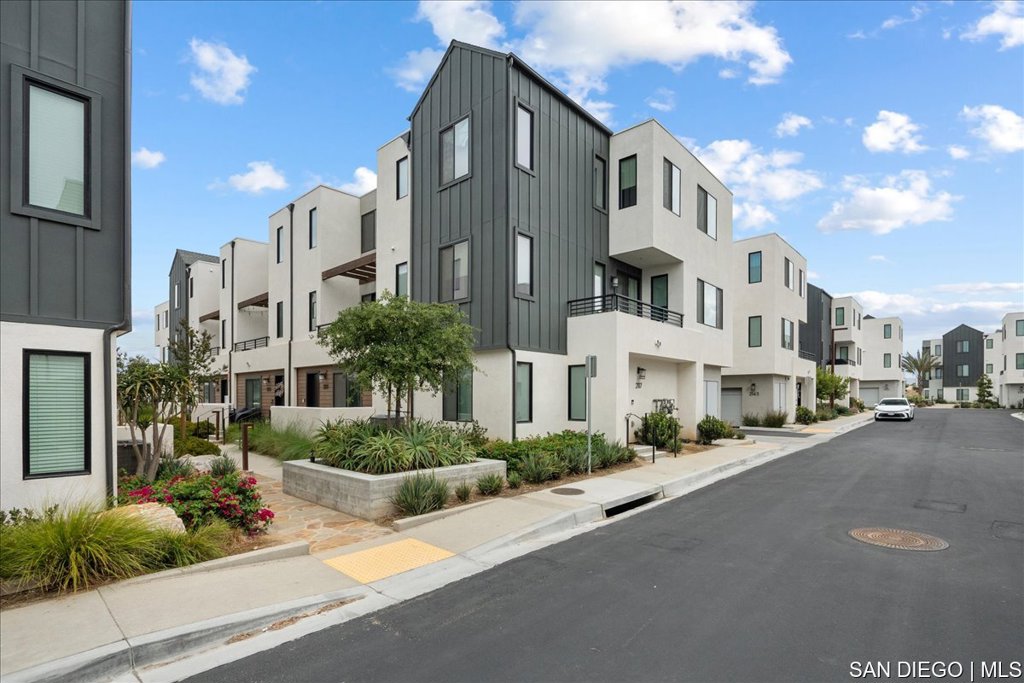 Nestled in the desirable neighborhood of Otay Mesa, this condo offers ease of access to major freeways, shopping, dining, parks, and all the amenities you expect. This very clean, beautifully loved home, is bright with natural light and sleek finishes throughout all 3 bedrooms and 3 full bathroom areas. This thoughtfully designed living space also includes an optional bedroom, office, den, or entertainment center on the first floor. The gourmet kitchen is outfitted with contemporary cabinetry, stone countertops, and high-end stainless steel appliances, ideal for entertaining. Newly built construction homes means modern systems, energy efficiency, and minimal maintenance. Enjoy this bright and open floor plan with comfort, style, and functionality today!