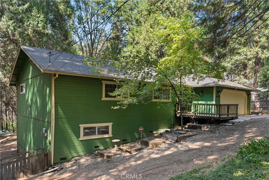 If you love nature and wildlife, then look no further. This rarity sits on over (1) acre and is located in the beautiful City of Magalia. This home boast over 1,400 SQFT of open living space. The exterior features a newly installed roof (2020), a 2-car garage, fully fenced yard for privacy, a propane tank, and a storage shed for your wood or tools. It gets better, be amazed with this beautiful, spacious back wood deck, and front wood deck. The interior features a spacious and beautiful open concept kitchen/dining living room, and a wood burning stove to keep you warm in the winter. Furthermore, the master bedroom features an extra-large walk-in closet, a sliding glass door that leads to the gorgeous back deck, linen closet, and dual sinks in the master bathroom. Additionally, there are (2) additional spacious bedrooms with spacious closets, along with a second full bathroom. In addition, this home is conveniently located near shopping centers, restaurants, parks, and is located near Skyway for easy travel to Paradise, Chico, or Oroville. Call or text today and make this your next home.