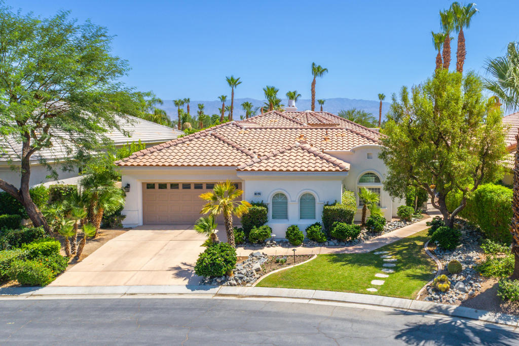 Experience the ultimate desert lifestyle just minutes from the charm of Old Town La Quinta. This stunning 3-bedroom, 4-bath home with a private casita offers plenty of space for relaxation and entertaining. Enter through a charming courtyard with a pergola into soaring 18-ft ceilings and light-filled spaces that instantly feel like home. The freshly painted exterior adds a crisp, polished look, perfectly complementing the lush landscaping and inviting curb appeal.Inside, travertine flooring flows throughout, leading to a gourmet kitchen with granite countertops, maple cabinetry, an island, and a spacious walk-in pantry. The master retreat is a true sanctuary, featuring a stone accent wall, dual closets, and French doors opening to your very private backyard oasis.Step outside to a serene space with lush landscaping, stamped concrete, a large covered patio, and a sparkling pool and spa--perfect for desert days and entertaining under the stars.Enjoy life at Mountain View Country Club with an 18-hole Arnold Palmer golf course, tennis courts, a fitness center, and a clubhouse offering fine dining and social events. Plus, you're just a short drive from world-famous festivals like Coachella Fest and Stagecoach.