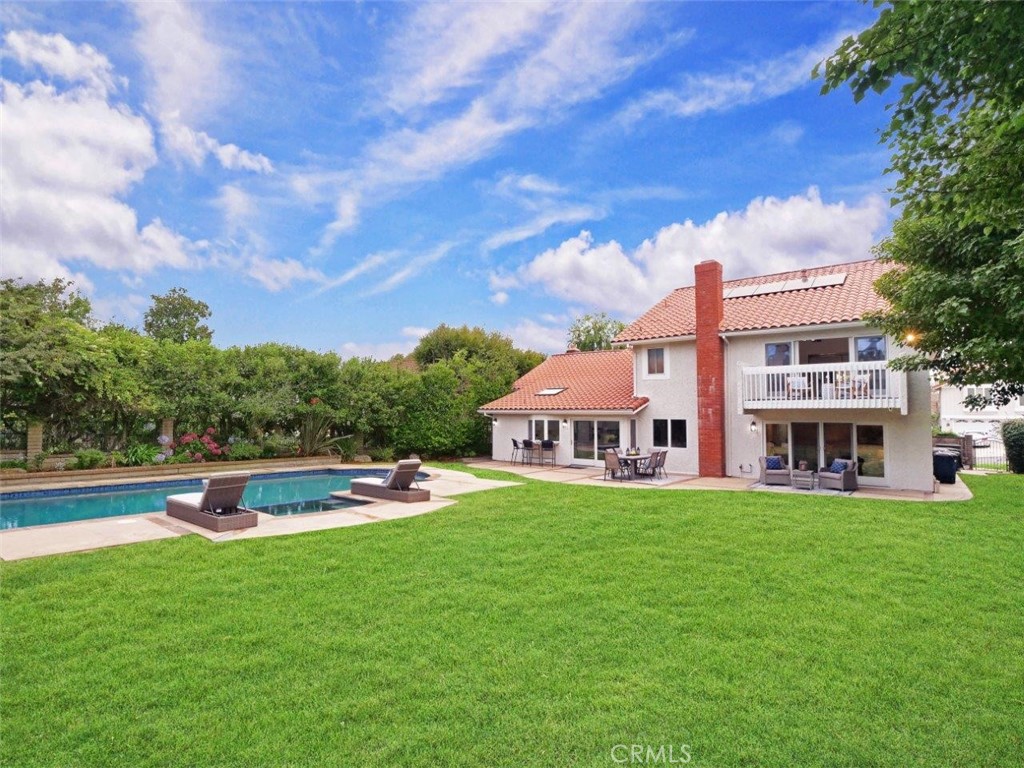 You won't want to miss this newly upgraded home in the gated community of Rolling Hills Park Estates. Set on an expansive 14,790 SF lot, the property features a stunningly remodeled pool and spa surrounded by lush landscaping—creating a true resort-style setting ideal for both entertaining and everyday enjoyment.
Inside, the chef’s kitchen boasts a large center island, premium new appliances, and a custom coffee bar, all designed for style and functionality. Two inviting fireplaces add warmth and character, while a main-level bedroom provides added convenience for guests or multigenerational living. Upstairs, the expansive primary suite with vaulted ceilings offers a peaceful retreat, complemented by neutral décor and timeless finishes throughout.
Significant upgrades over the past six years include new plumbing, a new roof, solar panels, and a complete pool and spa renovation. More recent improvements include a remodeled kitchen, high-end appliances, fresh interior and exterior paint, and updated lighting. Additional features include a 3-car garage and the peace of mind that comes with 24/7 gated security.
The Rolling Hills Park Estates HOA offers exceptional amenities: tennis and paddle tennis courts, sand volleyball, playgrounds, equestrian stables with riding facilities, and scenic bridle and hiking trails. Ideally located near award-winning Palos Verdes schools, shops, and dining, this is a rare opportunity to own a turnkey property in one of the Peninsula’s most desirable communities.