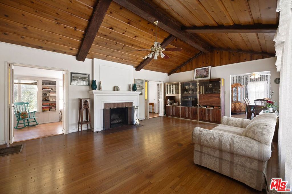 Exciting Opportunity for Contractors, Investors, Developers, and Owner-Users! Unlock the potential of this remarkable property situated on a sprawling 21,000 SF lot in the heart of the San Fernando Valley, just north of Tarzana and Encino. This charming 4-bedroom, 3-bath ranch-style home features with an additional converted garage ADU, offering versatile income opportunities or space for extended family. Explore the possibility of subdividing the lot under SB 9, or consider building additional units to maximize your investment. This centrally located property in Reseda is part of one of the fastest-growing sub-markets for multi-family investments in the Greater Los Angeles Area. The area's recent suburban development and diverse population make it highly desirable for both renters and homeowners alike. Step inside to discover beautiful vaulted wood ceilings in the sitting room, complemented by ample natural light throughout the home. Don't miss out on this unique opportunity to invest in a prime location with immense potential. Contact us today to schedule a viewing!