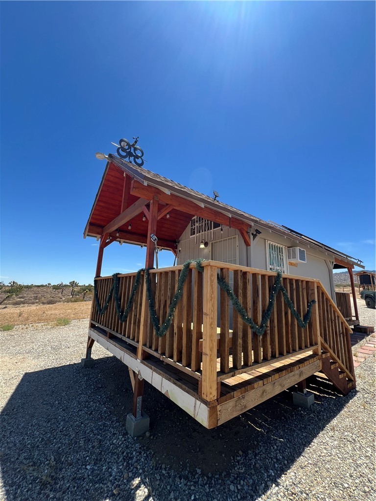 PARCEL# 3062-002-039 Coordinates: 34.469478, -117.773966 3.4 Acres with un ubstructed views of the whole Desert valley, Fully Fenced Surveyed, Security cameras survey the the property. Tiny Home incluled with running water Via a water Tank, power and septic, power is generated through the Solor paner System with batteries 1 bedroom 1 bath. Hot water heaters and air conditioning unit A Must See!