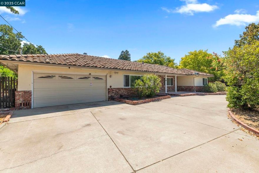 Discover the allure of this expansive single-story 4bd/2bth rancher with attached 1bd/1bth ADU situated steps away from the vibrant heart of downtown Broadway Plaza. Nestled on nearly three-quarters of an acre (0.73), this property presents an exceptional opportunity for significant expansion including an “additional” ADU or a potential subdividing lot subject to Walnut Creek's approval. The lot itself is a near-perfect rectangle, offering an ideal canvas for your vision. Be sure to review the drone photos for stunning overhead views. This residence is an entertainer and chef's dream, featuring a spacious cherrywood kitchen complete with elegant tile backsplash and a full suite of stainless steel appliances, including a double oven, chimney style hood. The home is bathed in natural light, thanks to the floor-to-ceiling wall to wall windows along the rear in the expansive bonus room. Primary bedroom on one end of the house, and three other bedrooms on the opposite side of home. The indoor laundry room is very spacious. Outside, there is a sparkling pool with water fountain, Baja Shelf and hot tub, spacious decks, two gazebos, grape vine field. AUD offers fully equipped kitchen, W/D, a full bath and split A/C and heater system. Located within the top rated Walnut Creek Schools.