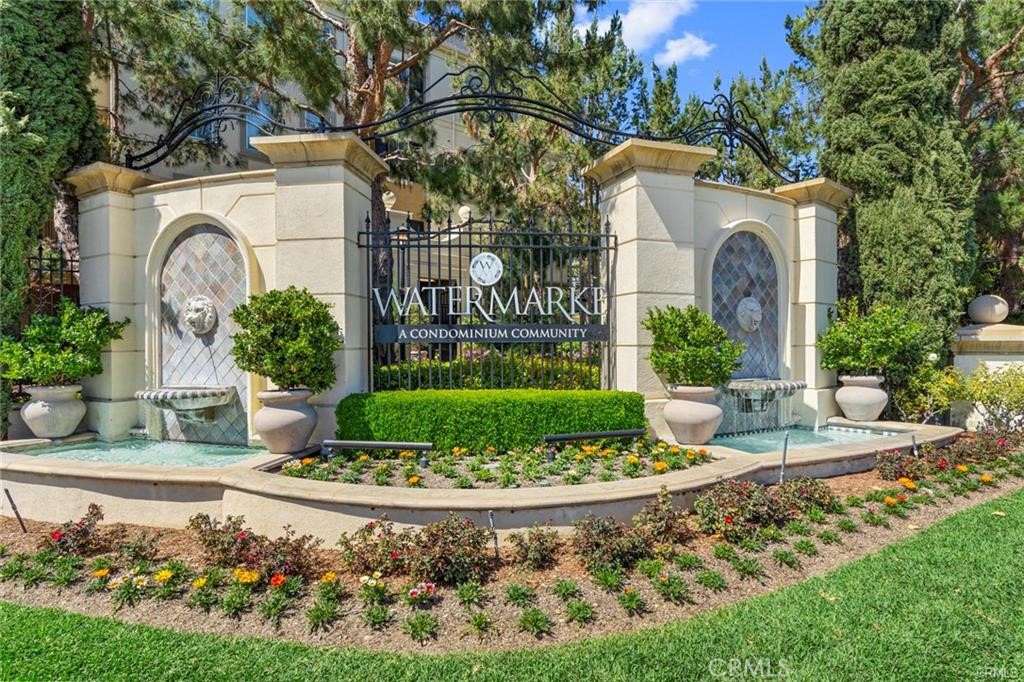 Welcome home to the only 1-bedroom floor plan within the Watermarke development with an office/den (which opens up to an extra large patio). The largest of four, 1-bedroom models, this home features: granite counter tops, wood flooring and stainless steel appliances in the kitchen (refrigerator included), granite counter tops and dual vanities in the bathroom, a walk-in closet, crown molding, designer paint and so much more. Along with the largest one bedroom model comes 2 covered parking spaces in the gated garage and access to all of the amazing amenities that Watermarke has to offer. With three resort style pools with cabanas, four hot tubs, concierge service, a private movie theater, billiards room, and a state of the art fitness center, you'll never need to leave the compound. Located close to the all major freeways, UCI, John Wayne International Airport and tons of great shops, restaurants and entertainment. This unit is something you will truly be proud to call your home.