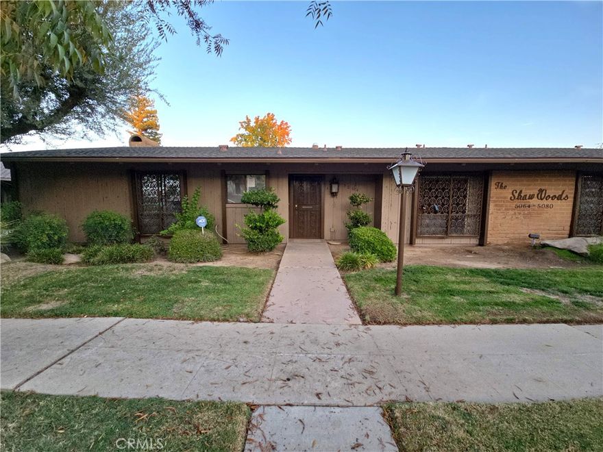 HUD Home - Welcome to this beautifully situated 2-bedroom (Possible 3 Bed), 2-bath, end-unit condo just steps from Fig Garden Village and the beauty of Historic Christmas Tree Lane! Offering the perfect blend of comfort, convenience, and classic Fresno charm, this home sits within a gated community featuring a sparkling pool and lush greenbelt.

Enjoy the rare advantage of frontage road access, allowing you to reach your front door without entering the gates plus convenient street parking right out front.

Inside, discover a spacious and inviting layout with high vaulted ceilings in the living and formal dining areas, creating an open, airy atmosphere. The kitchen features granite countertops and a cozy eating area that could easily be expanded into a chef's kitchen.

Per public records, the condo is a 3-bedroom unit, though one wall has been opened to the living room, creating a versatile office space. Simply reframe the wall to restore the third bedroom if desired.

Step outside to your private patio spanning the entire length of the home, offering direct access to the community greenbelt and pool perfect for relaxing or entertaining.

Experience the charm of this walkable neighborhood where residents enjoy year-round strolls to Fig Garden Village and the annual Historic Christmas Tree Lane. Shopping, dining, and top-rated schools including Bullard High are all nearby, with easy freeway access for quick commutes. Plus, take a short drive down Shaw Avenue to California State University, making this an ideal location for all.  Please contact your Realtor today for more details, as this home is available on a timed bidding schedule and will be gone before you know it!