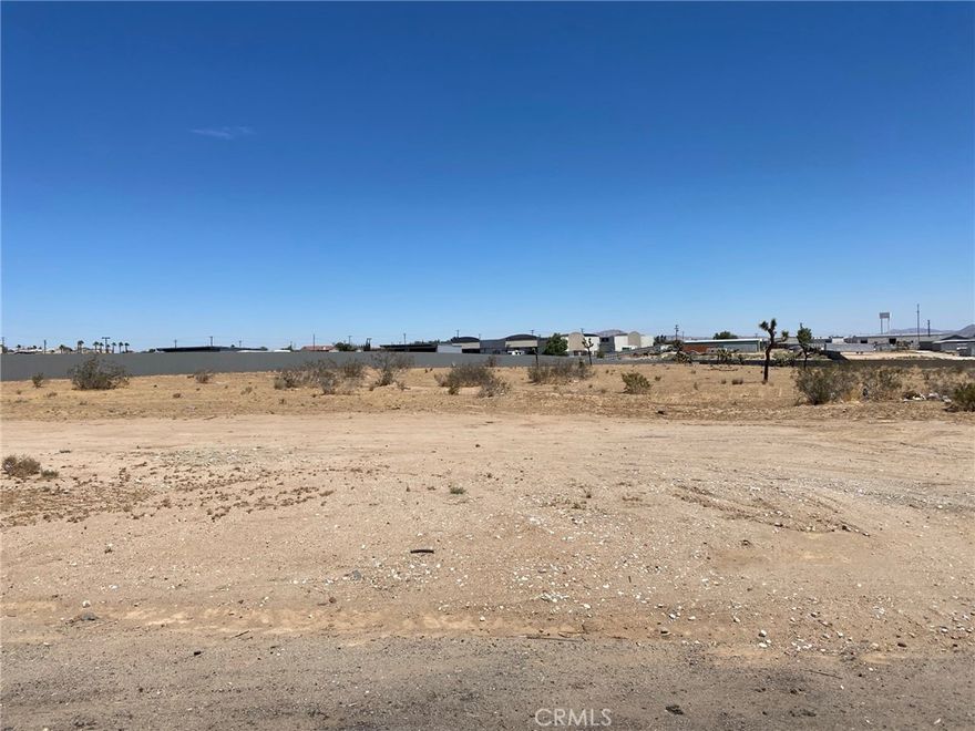±3.5 acres of unimproved industrial land for sale on Mesa St in Hesperia; APN: 0415-211-20. Zoned General Manufacturing (I-2) this lots permits for a variety of heavy industrial uses such as manufacturing, fabrication, warehousing, logistics, outdoor storage, and more. Water, sewer, and power, are all available at site. Neighboring businesses include Primo Auto Salvage, Advance Disposal, SA Recycling, Cruz Auto Repair and Towing, Gustin’s Cabinetry, RIC Construction, Jalisco Auto Dismantling, and more. This site is located just south of Bear Valley Road, a point of access for Hesperia, Victorville, and Apple Valley and a connector to traffic arterials. Buyer to verify all information contained herein. Agent and their representatives are not responsible for the accuracy of these claims.