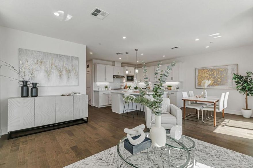 Situated in a prime Santa Clara location, this stunning 5-year-new townhome by award-winning SummerHill Homes enjoys one of the most desirable settings in the Nuevo community, overlooking the vibrant community park. The sun-drenched open layout showcases high ceilings, hardwood floors, recessed LED lighting, and a chefs kitchen with quartz slab countertops, soft-close cabinetry, and a GE Profile stainless-steel appliance suite that flows seamlessly to a private balcony for effortless indoor-outdoor living. Two spacious en-suite bedrooms include a serene primary retreat with walk-in closet and dual-sink bath, while additional highlights include a stylish powder room, EV-ready 2-car side-by-side garage, electric curtain system, Nest thermostat, GE front-load laundry, and upgraded R-11 wall insulation for enhanced comfort and efficiency. Community amenities feature a clubhouse, dog park, playgrounds, basketball court, picnic areas, and an outdoor movie lawnall complemented by low Santa Clara utility rates. Ideally located within walking distance to Nvidia, Qualcomm, Costco, Whole Foods, and Lawrence Caltrain, with easy access to Apple, Google, Tesla, and major highwaysplacing the best of Silicon Valley right at your doorstep.