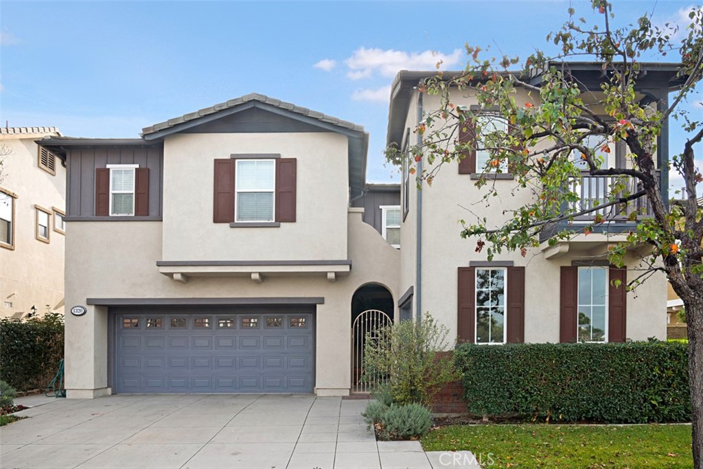 Spacious 3,360 sq. ft. former model home in Tustin Field—5 bedrooms, 4 baths, including a main-floor bedroom with full bath, plus a home office and detached studio with private entrance. Bright open kitchen with oversized island, high ceilings, hardwood floors, and a private backyard. Primary suite features a spa-style bath and custom walk-in closet. Three-car garage with epoxy floors. Community amenities include pool, sport court, and park. Located in the Irvine School District, minutes from The District, shopping centers, and freeways.