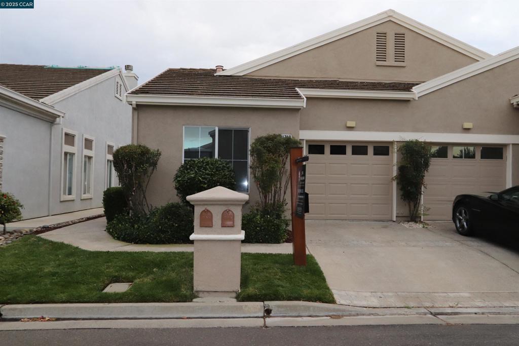 This is a duet – The Bartlet model - Open SUNDAY Oct 12th from 12-3pm. This home has 2 bedrooms, 2 baths and a 1car garage with extra depth. The home is about 994 sq ft (see floor plan). Kitchen has tile counters, lots of cabinets, gas stove/oven, microwave, dishwasher and refrigerator and custom flooring w/ large dining area. New carpet & paint throughout the interior plus some nice ceiling fans. A large living / family room with plantation shutters. Primary bedroom w/ walk-in closet, primary bath has a stall shower. On the other side of the house is the guest bedroom and guest bathroom with a tub/shower combo. The laundry is a stackable washer & dryer in a closet. These duet lots are not huge with about 2,570 sq ft, however, check out the nice patio & patio cover, new grass and low maintenance landscaping and no rear neighbors. Summerset 1 is a gated 55 + senior community - The HOA is $175 monthly and includes swimming pool, hot tub, gym, tennis, bocce ball, activity clubs to join, dinners & dances, security gates & more. Just minutes away from Kaiser Hospital & John Muir, Safeway & CVS.
