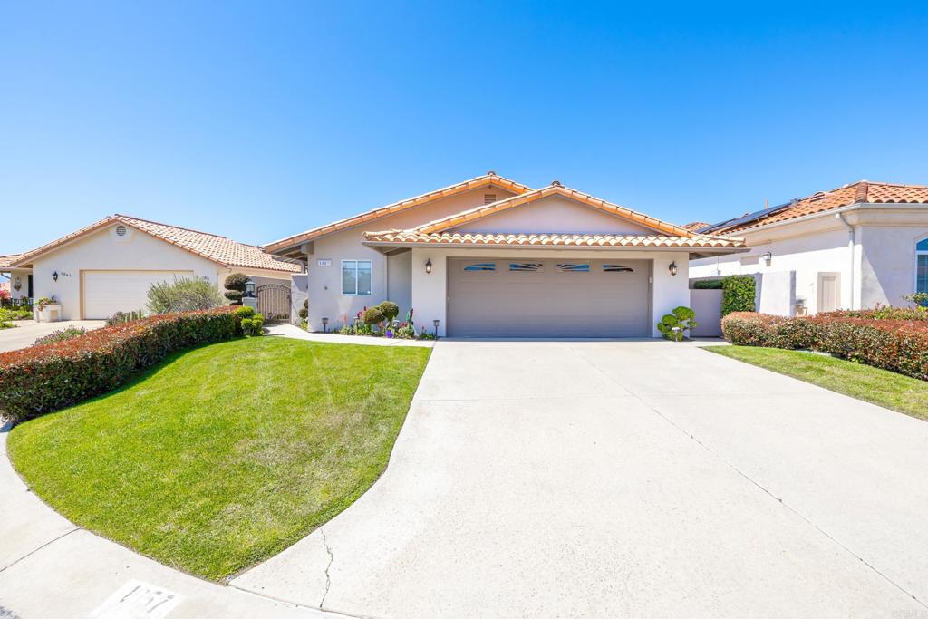 Price Drop! Best Deal in town!! Ready to move!! Single Story, Spacious, East Ridge 55+ Home, 2,712 Sq Ft, 3 Bedroom, 2.5 Bath home with Mountain & Town Views! This gorgeous home has 2 primary suites + optional 3rd bedroom/office, large spacious hallway, laundry room, and tons of storage. Light-filled open floor plan with coffered ceilings, fireplace & wet bar. Gourmet kitchen boasts granite, stainless appliances, 5-burner stove & breakfast nook opening to expansive view deck and large family room with wood accent ceilings. Primary suite has a Luxurious remodeled bath with walk-in shower & clawfoot tub. 2nd primary suite has an enclosed garden area, to connect with peaceful outdoor space from the shower. Oversized 2-car garage with separate 8x8 workshop & attic storage. Covered patio offers stunning mountain & town views and a small garden area. Resort-style community amenities: pool, clubhouse, tennis, pickleball, bocce, putting green, dog park, garden, RV parking & walking paths. Fridge, washer & dryer included—live where every day feels like a retreat!