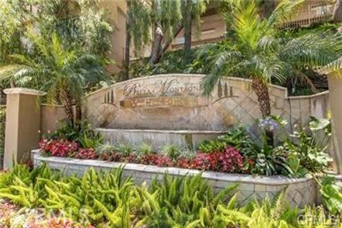 Photo of 5220 Premiere Hills Circle, Woodland Hills, CA 91364 (MLS # SR26082867)