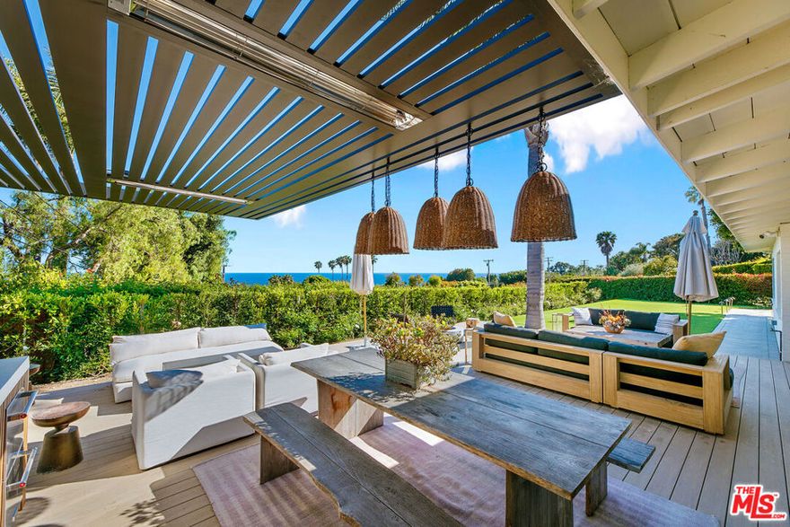 Welcome to this Malibu retreat with 180 degree ocean views and indoor-outdoor living that is close to central Malibu and walkable to the town's famous beaches and surf breaks.  Its designer light filled and inviting interior hosts an open floor plan with ocean views from nearly every room that will have guests wanting to relax at the property.  This charming single level home incudes 3 bedrooms, 2 bathrooms, outdoor shower, gourmet chefs kitchen with white stone counter tops, a dining room with a wooden table ready to create special memories, and a living room with large couch to enjoy the epic scenery that gives Malbu its reputation for being a world renowned wellness destination.  The main suite includes a walk through closet to a private office with ocean views for inspiration.  The second bedroom includes mirrored closets with ocean views to unwind.  The hallway includes a bathroom with two stand alone sinks and a freestanding bathtub.  On the opposite side of the home there is a third bedroom with built in bunk beds and its own bathroom with shower.  The newly updated and well manicured spacious yard holds numerous entertaining areas including an outside kitchen bbq area with large flat screen tv ideal for sport lovers, an al fresco dining space for foodies, a fire pit for sharing stories, patio couches for sunbathers and a recently upgraded lawn ideal for everyone in the family to enjoy.  EV charger. Exterior security cameras on property. Weekly cleaning service required and owner has established property house cleaner that can be added at additional cost. **Please note the 800 square feet guest house may be included for an additional fee; it includes a full kitchen, bedroom, bathroom, washer and dryer and its own fully gated private yard area with views of the sea. Guest house may be included for an additional asking fee of $5000 per month and may be included for the entire duration of the lease or for specific durations.**  This unique property is a true hidden gem surrounded by nature and offers a peaceful sanctuary for guests to thrive.