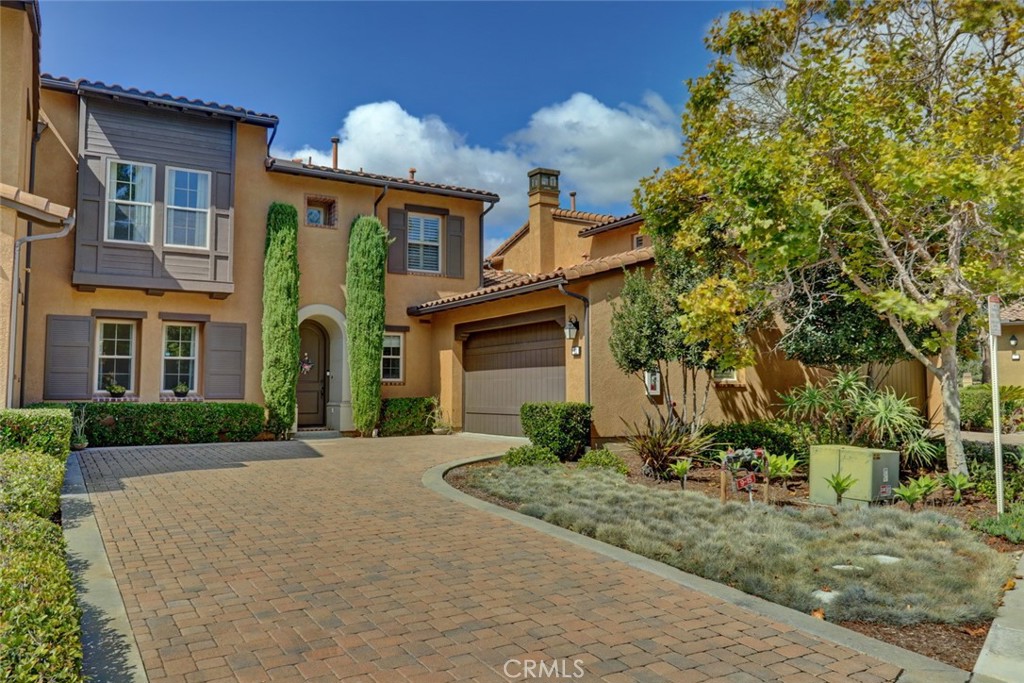 Welcome to 11 Tuscany, a charming Italian-inspired villa located in the exclusive gated community of Covenant Hills in Ladera Ranch. Nested on a private cul-de-sac, this home offers 3 bedrooms, 2.5 baths, and a private driveway leading to a two-car garage. Step inside and enjoy the open floor plan filled with natural light. The gourmet kitchen is the heart of the home, featuring granite countertops, stainless steel appliances, a large center island, and a built-in wine fridge. The kitchen flows seamlessly into the family rooms, complete with a cozy fireplace and direct access to the backyard, perfect for relaxing or entertaining. The rich hardwood floors add warmth and elegance throughout the main level. Upstairs, the primary suite is a true retreat with a private balcony showcasing beautiful views. The spa-like bathroom includes dual sinks, a soaking tub, a walk-in shower, and a large walk-in closet. Secondary bedrooms are spacious and versatile for family, guests, or office use. The backyard offers peaceful views and plenty of room for gatherings, while the community enhances your lifestyle with pools, clubhouses, tennis courts, trails, parks, and schools. As a resident, you’ll also enjoy access to exclusive concierge services by Castellina, help with home care, reservations at top restaurants, travel planning, event assistance, premier sports tickets, and more, making everyday life simpler and more enjoyable.
11 Tuscany is more than a home; it’s a lifestyle.