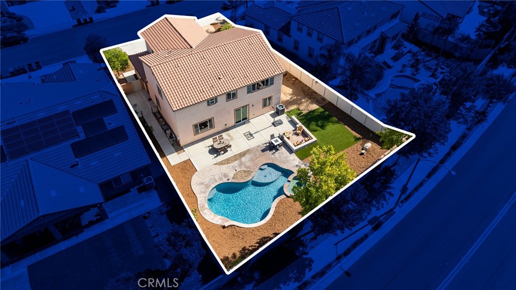 Welcome home to this amazing POOL home located in the prestigious community of Audie Murphy Ranch in Menifee. This exquisite 5 bedroom, 4 bath property offers almost 3500 sqft of living space featuring a loft, a main floor junior suite, 2 main floor bathrooms, 4 bedrooms upstairs, an oversized 9500 sqft lot, 3-car garage, mountain views and drought tolerant landscaping. Being in the Audie Murphy Ranch community this home is just steps away from the award winning Taawila Elementary school, close to trails, the skate park, sports park and within minutes to the freeway and tons of shopping. As you enter the home you are greeted by tall ceilings, recessed lighting, LVP floors, neutral paint and a very desirable floor plan. The Large dining room offers tons of light flooding in from the large windows and flows right into the butler’s pantry boasting granite counters and built-in cabinets situated across from the large walk-in pantry. The chef’s kitchen is appointed with granite counters, double ovens, 5 burner stove, and eat up island which faces the large eating area and right into the grand Great Room. The main floor offers a spacious junior suite boasting new carpet, a ceiling fan, standard closet and attached bath featuring a single vanity and walk-in shower. The second main floor bath is a powder room perfect for guests just off the entrance to the 3-car garage offering hookups for a soft water system. The second story boasts a massive loft, the three large secondary bedrooms, all featuring new carpet, gorgeous views and two of the three have walk-in closets. They all share a secondary bath boasting a dual vanity and shower tub combo. The oversized primary bedroom offers new carpet, a ceiling fan, tons of natural light, views of the yard and an attached bath boasting a dual vanity, seating area, soaking tub, shower and large walk-in closet. The 9500sqft entertainers dream yard features concrete for entertaining, a saltwater pool with baja step, built-in spa, large area with artificial turf, a built-in seating area perfect for a fire pit and tons of space to continue building your dream yard. The community also features pools, spa, club house, meeting and banquet rooms and the new Kathryn Newport Middle school. The home is located between the 15 and 215 freeways, 20 minutes from the Temecula Wineries, an hour to San Diego, Orange County and LA. This is a home you do not want to miss!