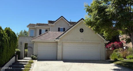 Delightful two story, 4 bedroom and 3 bath home with expansive 3 car garage in desirable Thousand Oaks community. This home features hardwood, travertine tile and carpeted flooring with a separate living room and family room area with gas burning fireplace. The upgraded kitchen has all stainless steel appliances, a center island and quartz counters. There is a downstairs bedroom with an adjoining bath and a separate laundry room. Upstairs you will find three additional bedrooms, a dual bathroom supporting two bedrooms and the primary suite with walk-in closet and a bathroom with tile counters, dual vanity and a separate tub and shower. Plantation shutters and crown molding enhance the home's interior. There is an appealing courtyard entry with colorful and attractive landscaping. This home is located close to shopping, parks, award winning elementary school and affords easy freeway access.