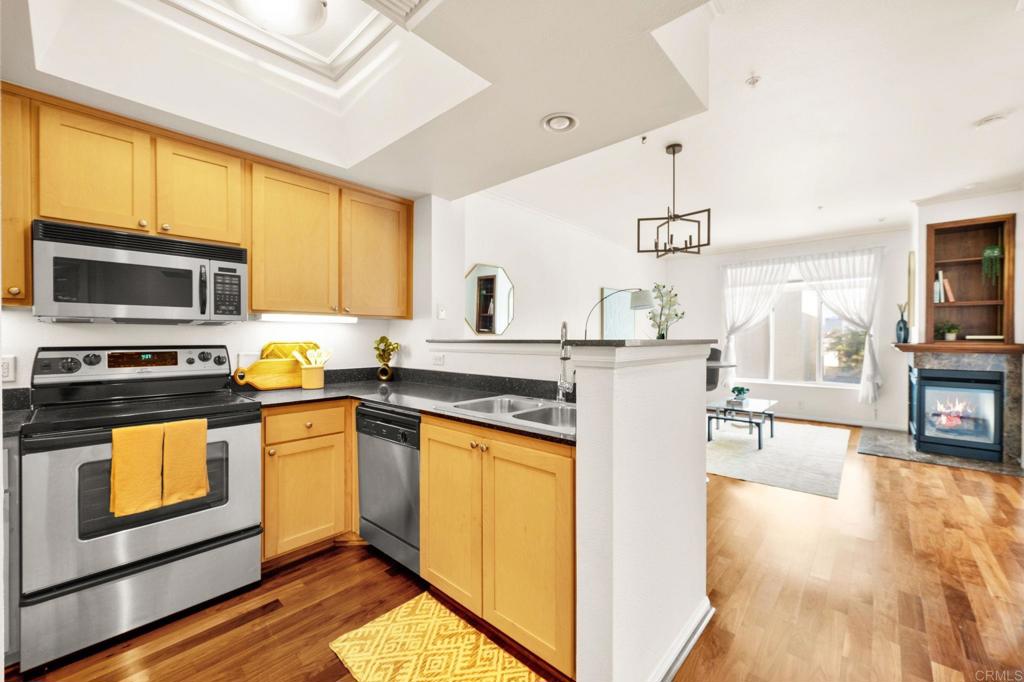 Discover incredible value in this charming studio condo located in the heart of Bankers Hill’s highly sought-after Laurel Bay community. Perfectly blending comfort and convenience, this first-floor home offers a light-filled open layout, an updated kitchen ideal for entertaining, freshly painted interiors, modern fixtures, and a private south-facing balcony to enjoy the San Diego sunshine. Step inside and you’ll find a thoughtfully designed space with seamless flow. The entire condo is open concept which is great for entertaining while still creating a warm and inviting atmosphere for relaxing evenings. The true highlight of this condo is its location and community. Laurel Bay offers resort-style amenities, including a sparkling pool, spa, fitness center, BBQ area, lounge, and an elegant lobby to welcome guests. Living here means being just minutes from some of San Diego’s best restaurants, shops, balboa park, little italy, Downtown, the airport, and vibrant nightlife. It's truly ideal for those who want to embrace the best of urban living.