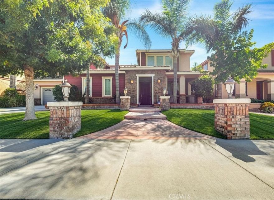 Discover this beautiful 4,305 sq ft home featuring 5 bedrooms, 4.5 bathrooms, and the rare convenience of dual staircases. A welcoming front porch leads to a private courtyard, creating a peaceful first impression. Step through the main front door into a grand foyer that sets the tone for the spacious layout.

The living room offers elegant double French doors that open to the courtyard, while the separate dining room provides courtyard views and direct access to the kitchen. The island kitchen has granite countertops, a walk-in pantry, a built-in desk, and opens seamlessly to the family room with a cozy fireplace. The elegance doesn't stop there: check out the iron balusters on the grand staircase, the crown molding and the whole house intercom system.  



Downstairs includes a private bedroom with a full bathroom, perfect for guests, along with an additional half bathroom for convenience. Each side of the home features its own staircase, enhancing flow and functionality.



Upstairs, the primary suite impresses with a spacious sitting room, large walk-in shower, dual vanities, a center soaking tub, and a generous walk-in closet. A large loft, three additional bedrooms (one with an attached full bathroom), two full bathrooms, and a laundry room with sink and cabinetry complete the second level.



The backyard offers a concrete patio and and planters ready for your design ideas. The location is perfect with Rosa Parks Elementary and Ramirez Intermediate walking distance as well as the Eastvale Community Center. Shopping and parks also nearby. This home offers exceptional space, comfort, and thoughtful design throughout.