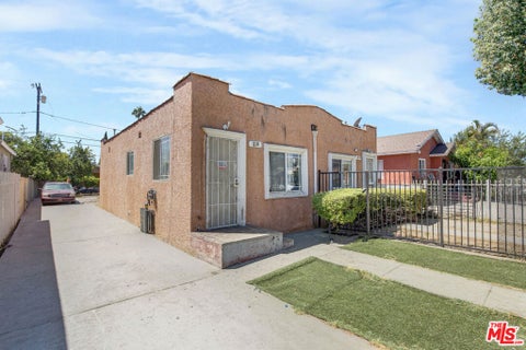 Photo of 1208 E 74th Street, Los Angeles, CA 90001 (MLS # 26873613)