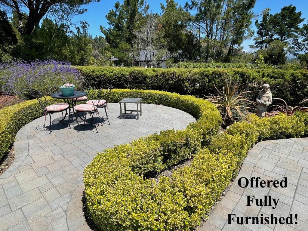 Welcome to 55 Glengarry Way, an exquisite fully furnished single-family home located in the tranquility of Hillsborough, CA. This one level residence offers an impressive 3,180 square feet of living space, featuring 4 spacious bedrooms & 3.5 bathrooms. The home's interior presents a blend of flooring, including carpet, hardwood, laminate, marble, & tile, each adding a distinct touch of elegance. The kitchen is equipped w/ a breakfast bar, cooktop, dishwasher, & electric oven. Granite kitchen counters, stainless steel appliances, & eat-in kitchen provide both functionality & style. The cozy ambiance of the living area, is accentuated by charming decorative fireplaces that add to the warmth of the home. The primary ensuite bathroom is a sanctuary, featuring double sinks, separate shower, & luxurious tub, ensuring a spa-like experience. The property also includes a formal dining room & dedicated home office, catering to both entertaining & productivity. Step outside to your private oasis, where a pristine pool awaits, surrounded by a fenced back yard, perfect for leisurely summer afternoons. Amenities include a laundry room furnished w/ washer and dryer. This home offers a blend of comfort, luxury, & practicality. Landlord will lease unfurnished with a minimum term of two years.