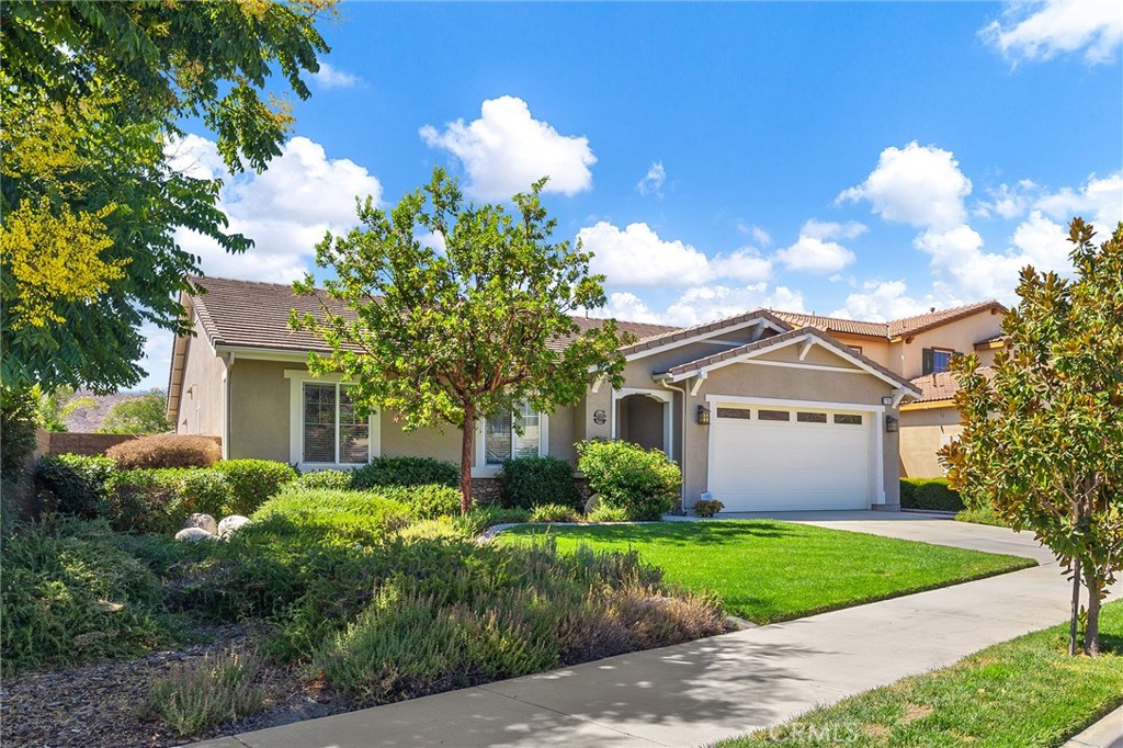 Welcome to this charming single-level 4 bedroom, 2 bathroom home perfectly situated at the end of a quiet cul-de-sac with gorgeous curb appeal. Step inside to find recently installed upgraded LVP flooring and updated interior paint. The spacious family room opens seamlessly to the chef’s kitchen, featuring granite countertops, a large island with an eat at bar, a roomy pantry, upgraded stainless steel appliances, custom pendant lighting, and a generous dining area—ideal for gatherings. The private primary suite is thoughtfully located on one side of the home and boasts a luxurious bathroom with dual sinks, soaking tub, step-in shower, and an oversized walk-in closet. On the opposite wing, you’ll find three additional bedrooms and a full bath with dual sinks and a custom step-in shower. Additional highlights include a large laundry room with extra storage and a wonderful backyard complete with a covered patio, lush lawn, and custom concrete work.
Enjoy resort-style living with community amenities including a pool, clubhouse, lake, multiple parks, and lots of walking trails.